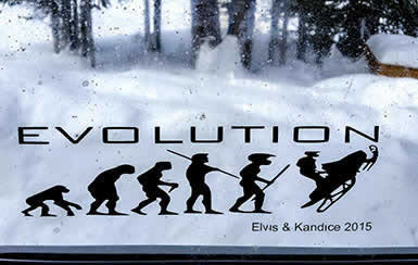 Snomobile evolution sign on Golden, BC window