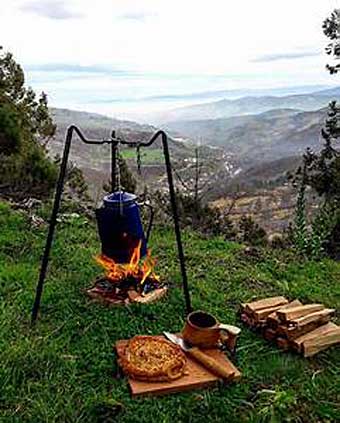 Cooking pot over fire